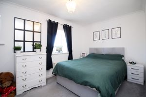 Bedroom One- click for photo gallery